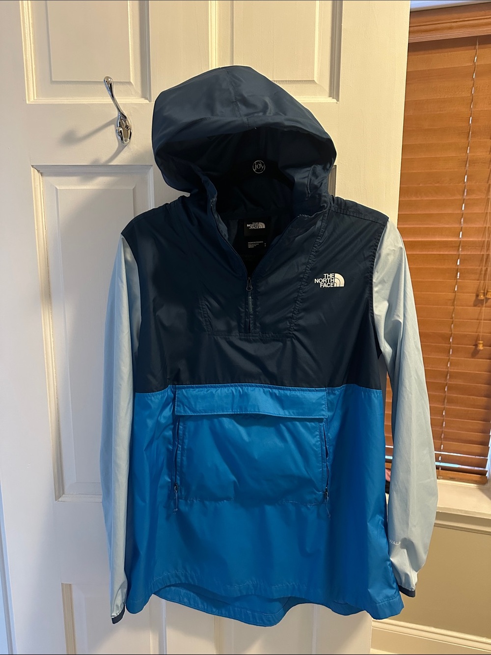 The North Face Women’s Navy, Royal & Light Blue Colorblock Hooded Windbreaker